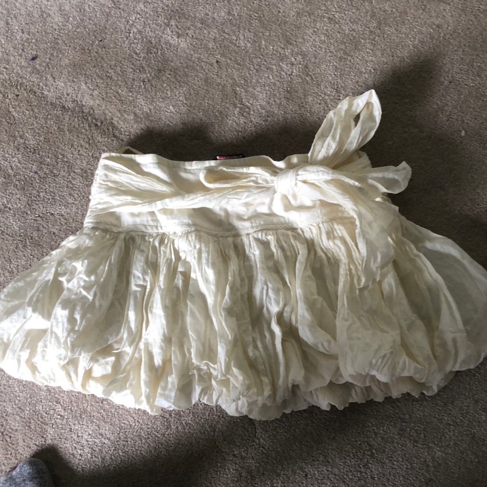 white ruffled skirt